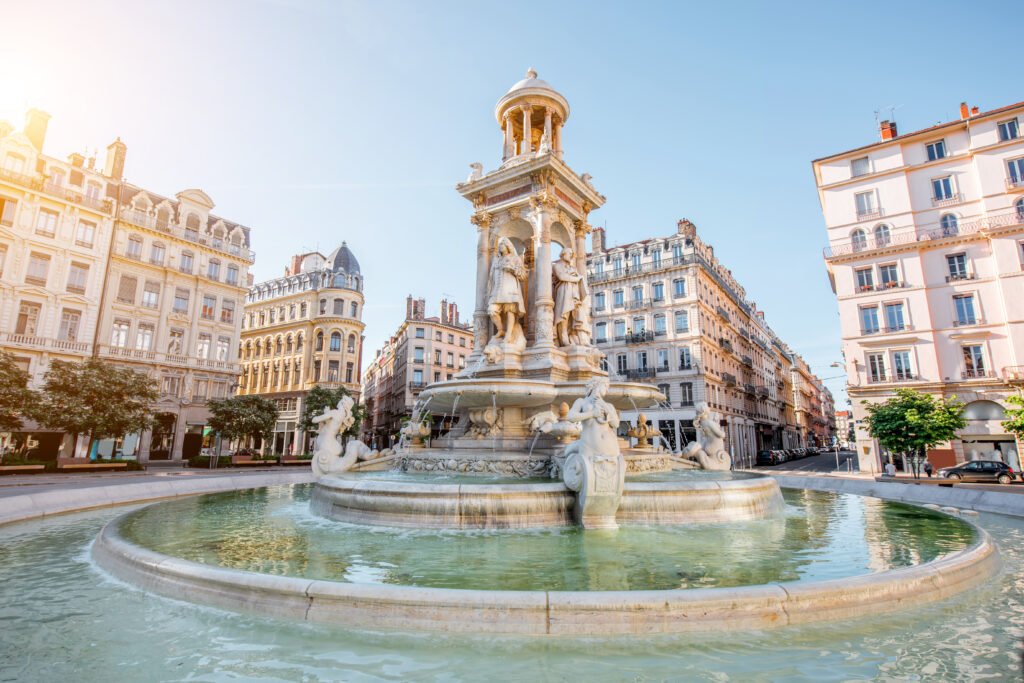 Aquatic Symphony in Lyon The image captures the grace of the Fountain of the Jacobins, a sculptural work of art and a historical landmark in the city of Lyon, surrounded by elegant Haussmannian buildings and urban vibrancy.