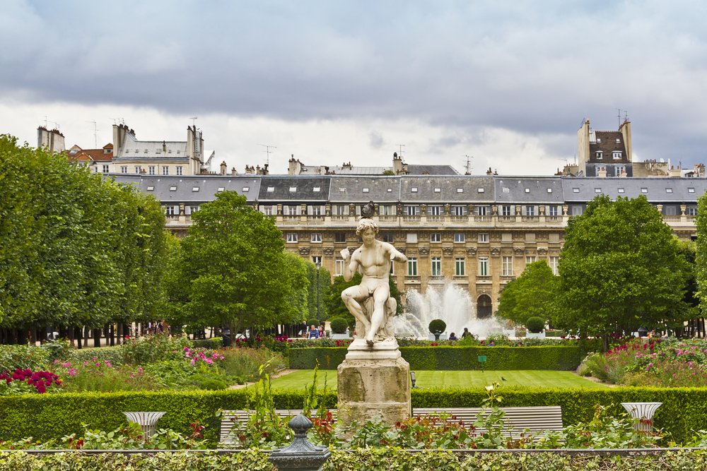 Classic sculptures amidst lush greenery embody Paris's elegant landscape. Discover the tranquility of Parisian gardens, where classic statues stand amidst blooming flowers and ornate fountains, creating pockets of serenity in the bustling city.
